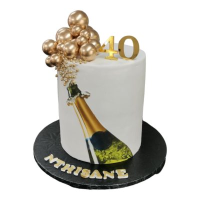 Popped Champaigne Bottle Birthday Cake